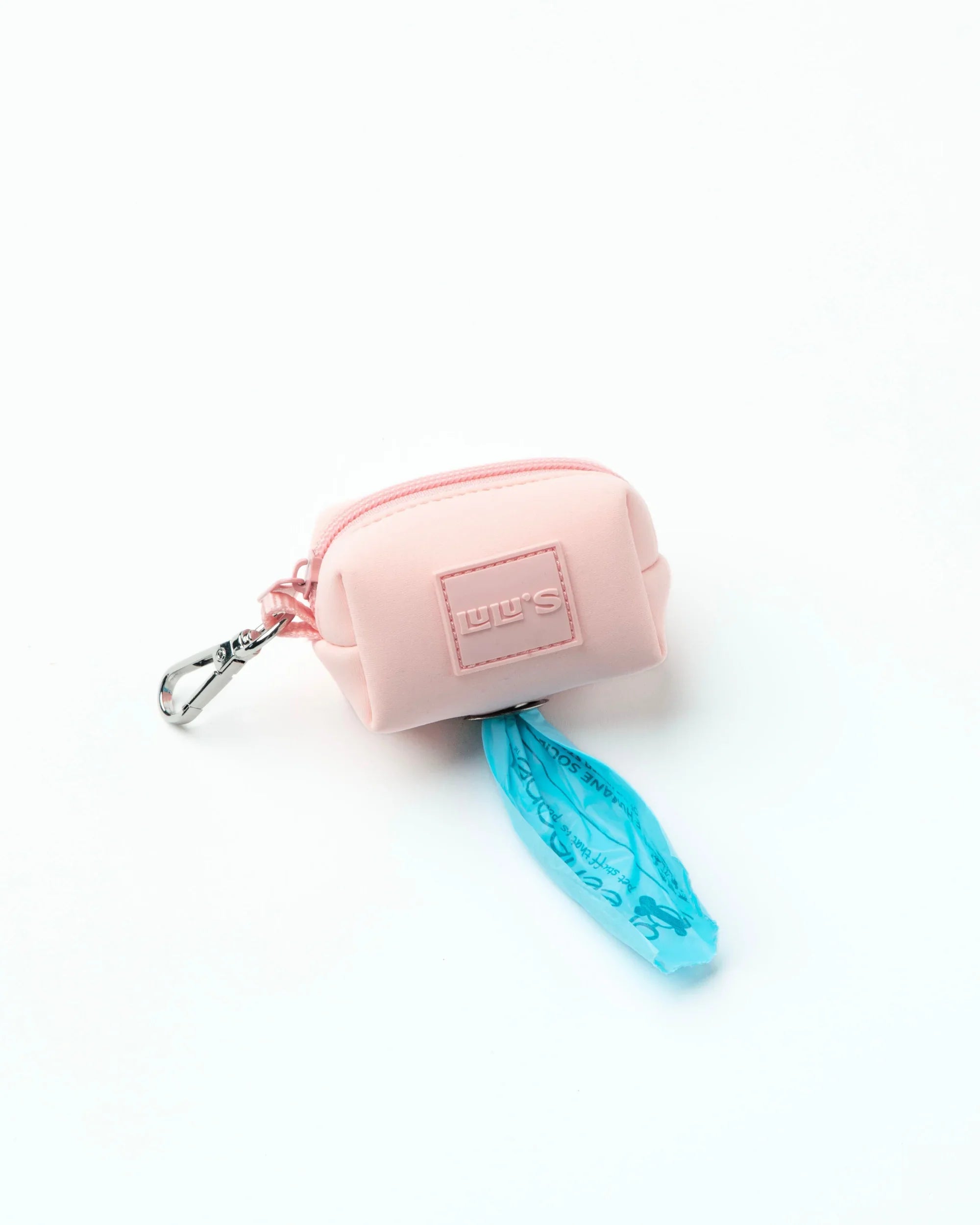 Pink waste bag carrier.