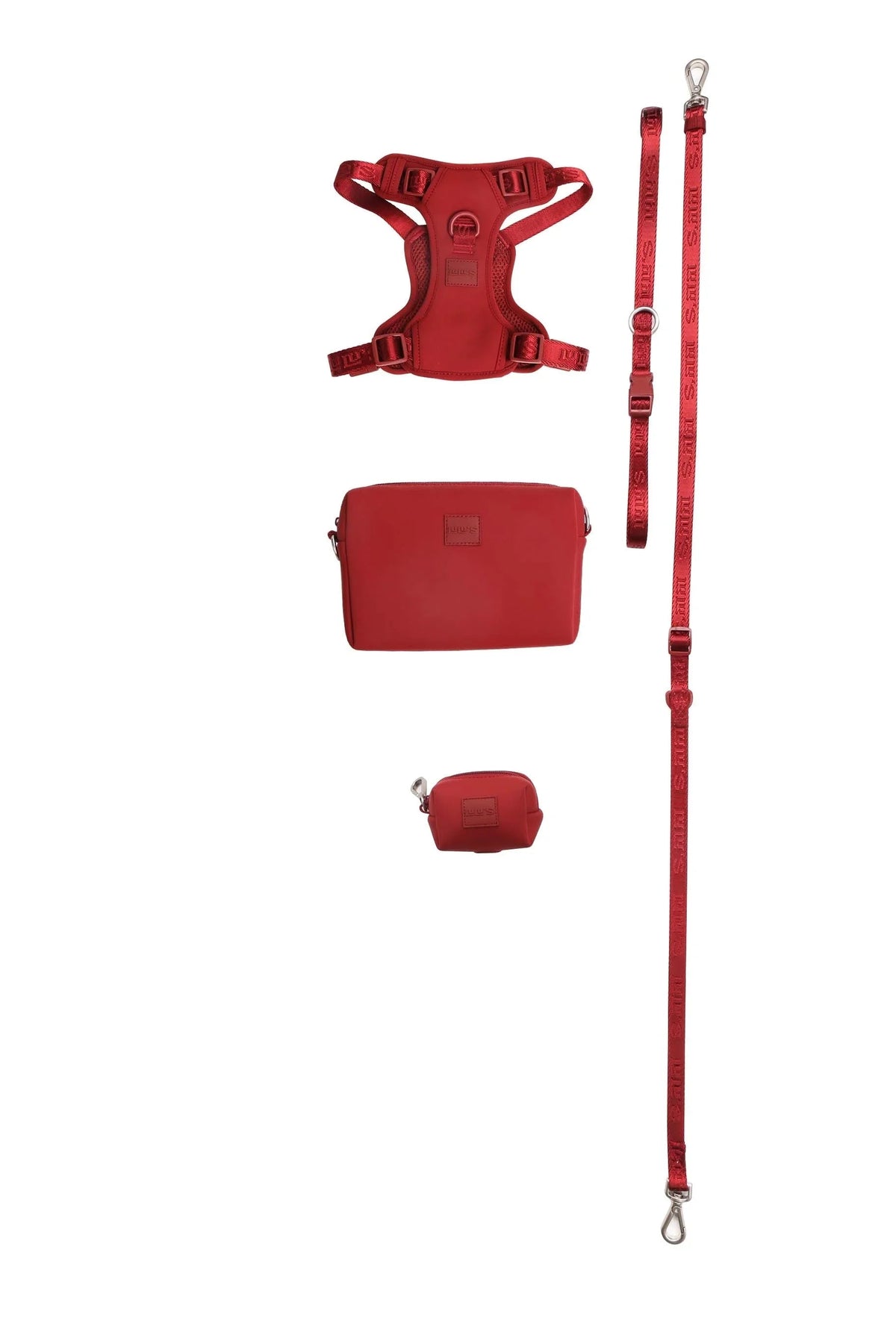 Cherry Red Lulu's from Cali walking set laid flat: harness, horizontal pouch, waste bag holder, leash and walking belt