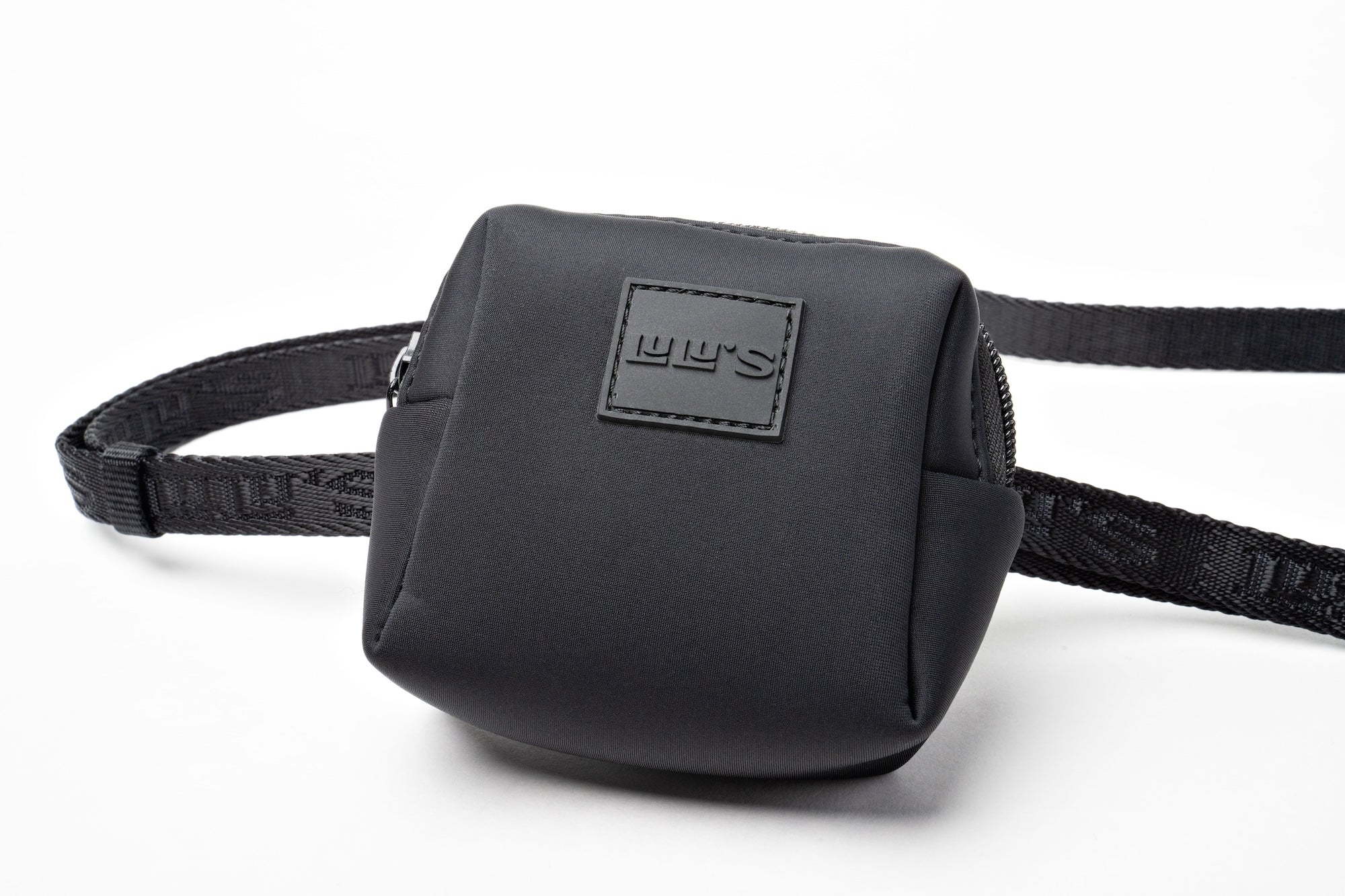 Close-up of Lulu's Midnight Black waste bag holder, featuring a sleek design with a secure zipper and adjustable strap.