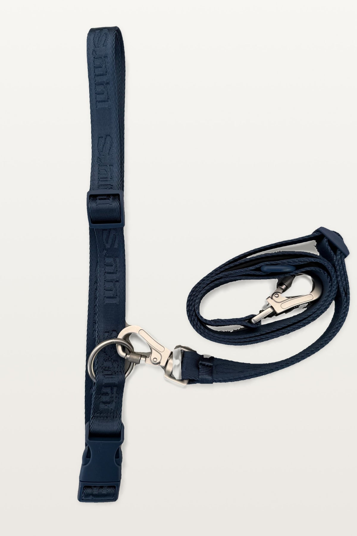 Blueberry Blue LULU'S from Cali hands-free leash with silver clips and buckle, laid flat on a light studio background