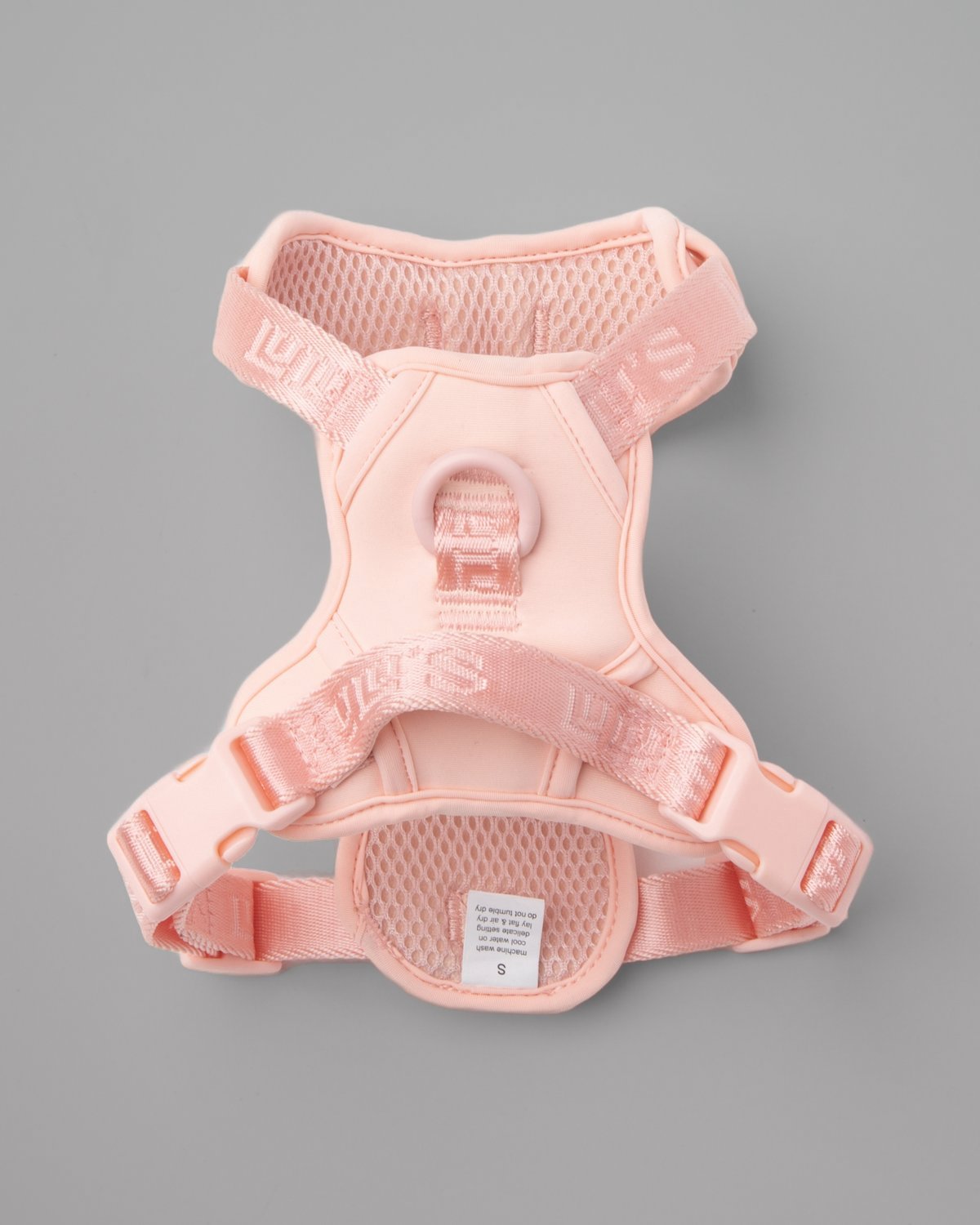 Blush Pink LULU'S from Cali adjustable dog harness, back view on a grey studio background